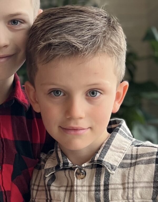 GUSTAV B.